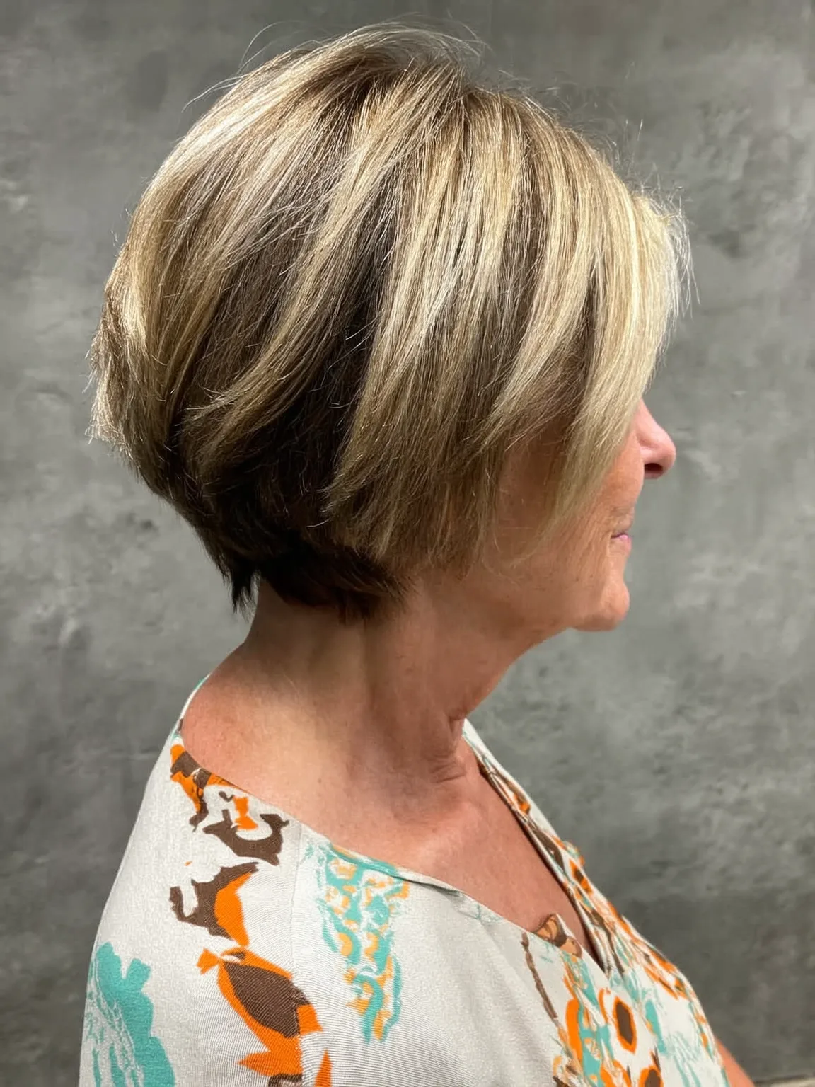 Voluminous Stacked Sandy Blonde Bob with Ash Lowlights